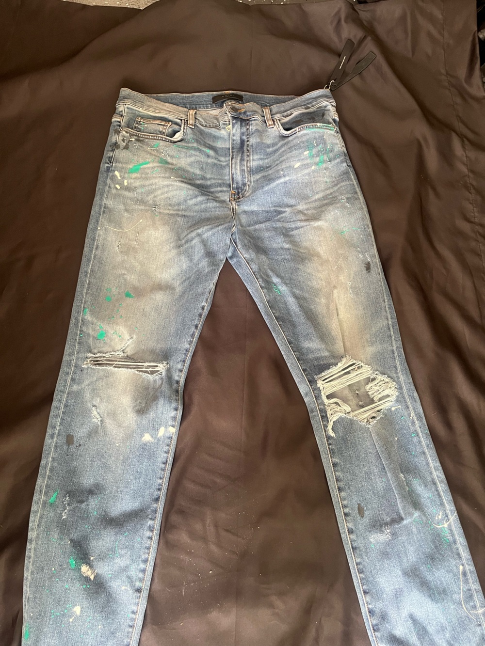 AMIRI Blue Skinny Jeans with Green Paint Accents